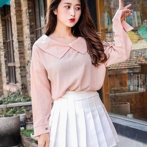 WHITE TENNIS SKIRT AND BLACK TENNIS
SKIRT PACK OF 2